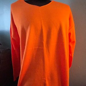 Bright orange sweater